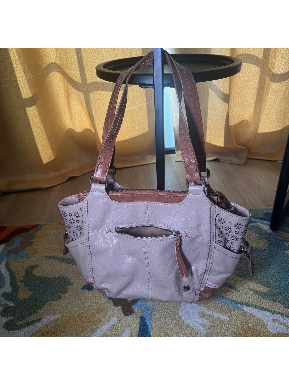 The Sak light pink leather shoulder bag with floral cutout sides